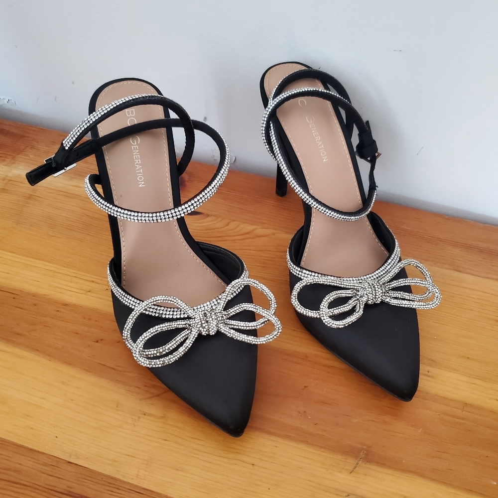 BCBGeneration Black Heels with Silver Bow Accents Size 8.5